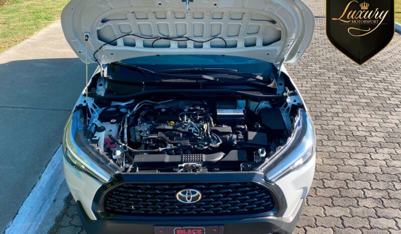 COROLLA CROSS XRE 2022 PEROLA completo