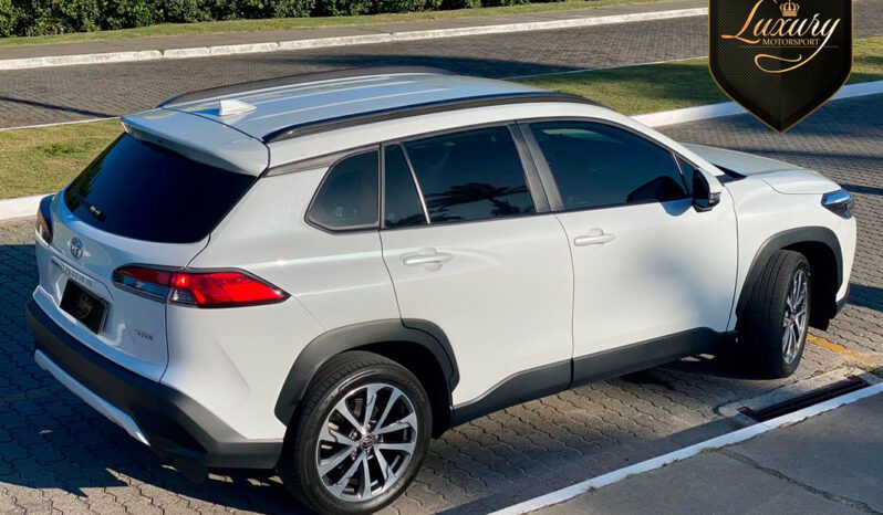 COROLLA CROSS XRE 2022 PEROLA completo