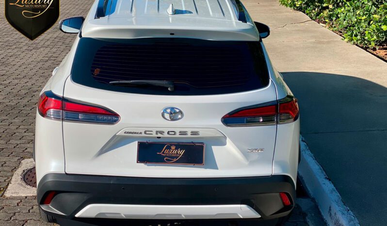 COROLLA CROSS XRE 2022 PEROLA completo