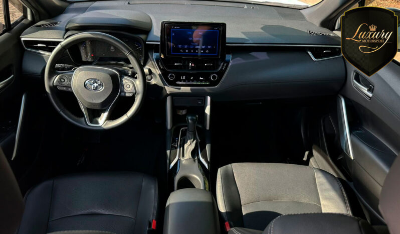 COROLLA CROSS 2023 XRE PEROLA completo