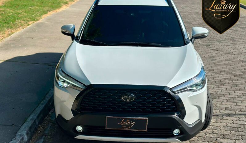 COROLLA CROSS 2023 XRE PEROLA completo