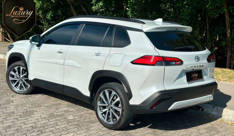 COROLLA CROSS 2023 XRE PEROLA completo